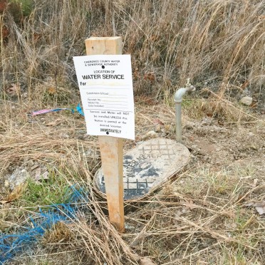 Water Meter sign posted on property