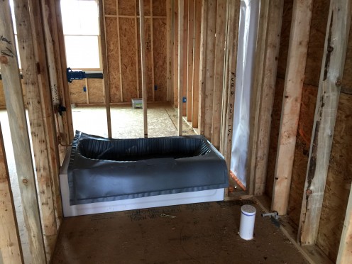 The tub in the bath above the garage.